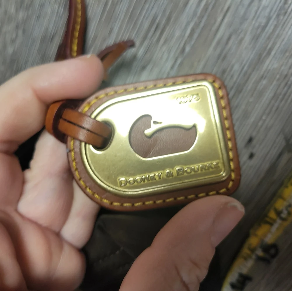 Dooney and Bourke Brown nylon Hand bag‎